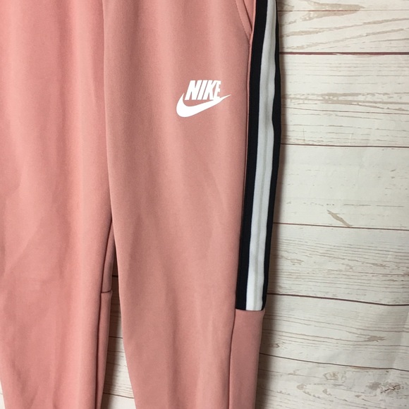 nike women's sportswear tracksuit joggers rust pink